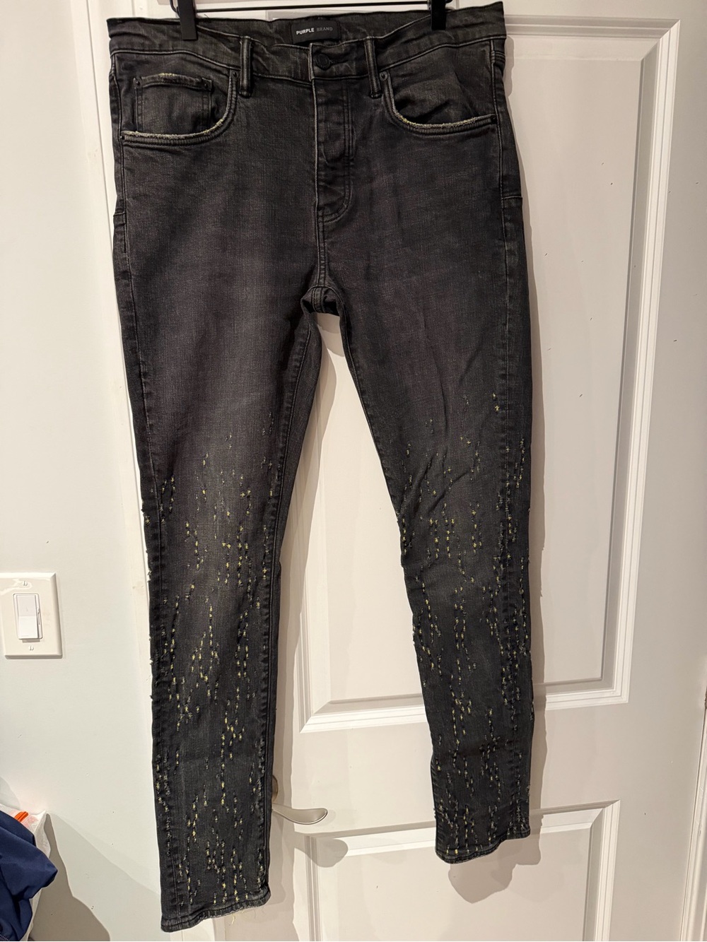 Black Skinny Jeans with Subtle Gold Paint Detail